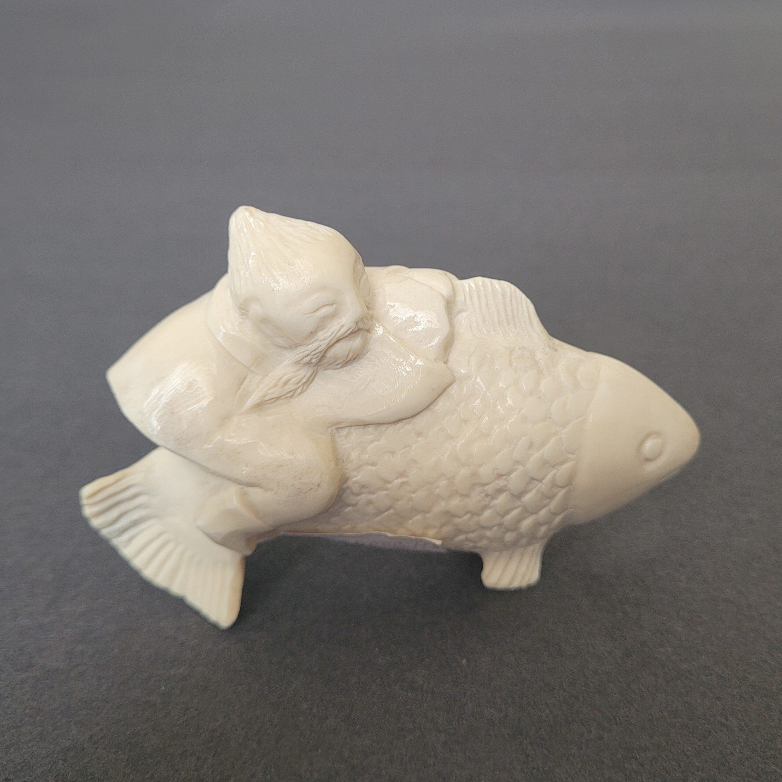 Hand-Carved Artwork "Old Man on a Fish"